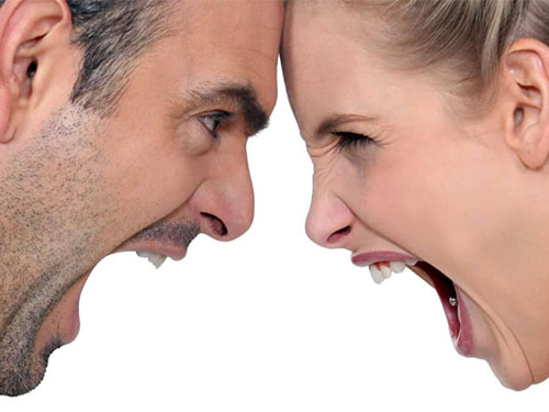 Man and woman yelling at one another